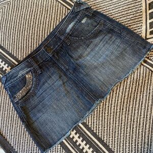 Embellished distressed denim mini skirt